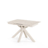 Mesa extensível Lori 160 cm travertino com tampo em porcelana e pés metálicos em X